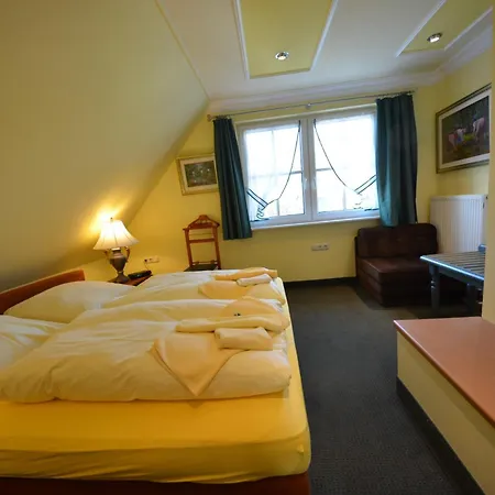Ferienhaus Kapitanshauser Boddenstrasse 29a-c Gager
